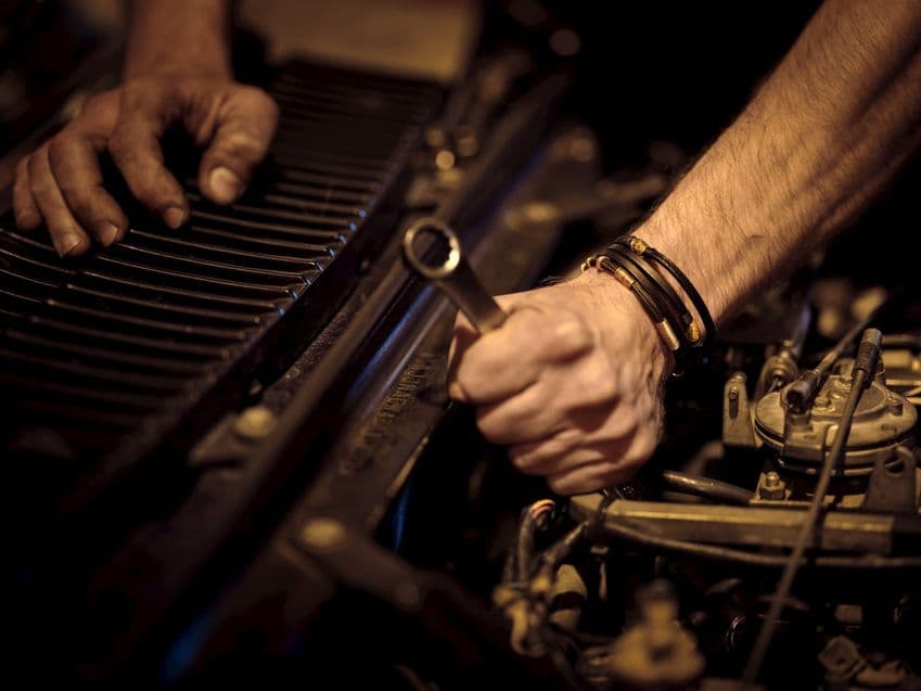 Mechanic fixing a truck